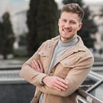 handsome-man-posing-outdoors-with-crossed-arms